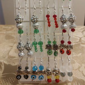 HAND MADE  PIERCED EARRINGS.